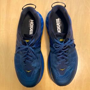 HOKA STINSON ATR 5. SIZE 11. LIGHT USE (WALKING). NAVY/GOLD.